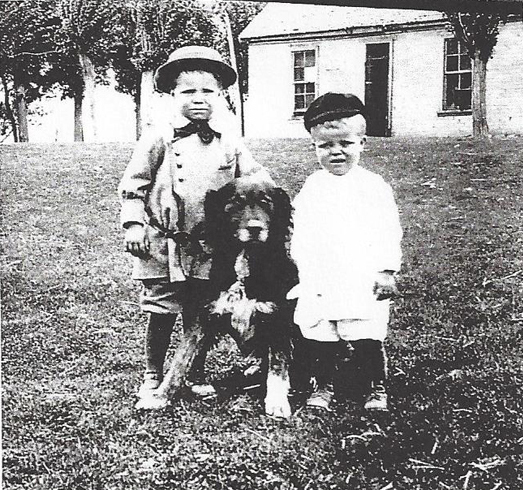 Two Adamson kids and a dog