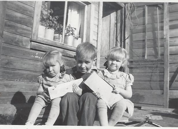 Three Children sitting down