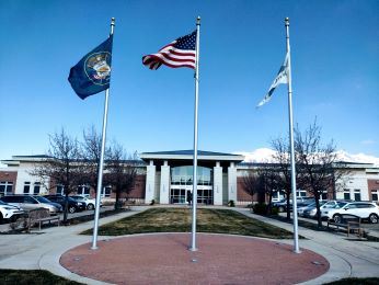 City Hall with flags on forefront