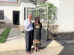 Oscar and Arlita in front of the English Learning Center